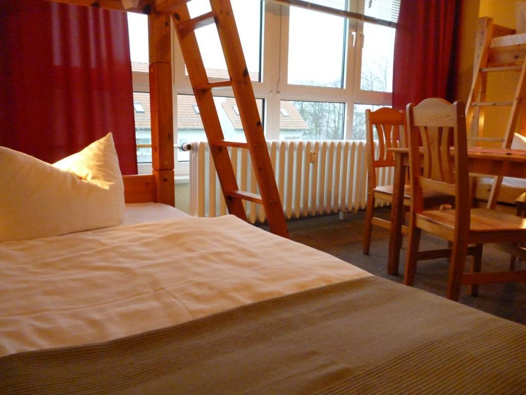 Hostel & Bistro Haus Der Horizonte Bad Doberan Rom bilde